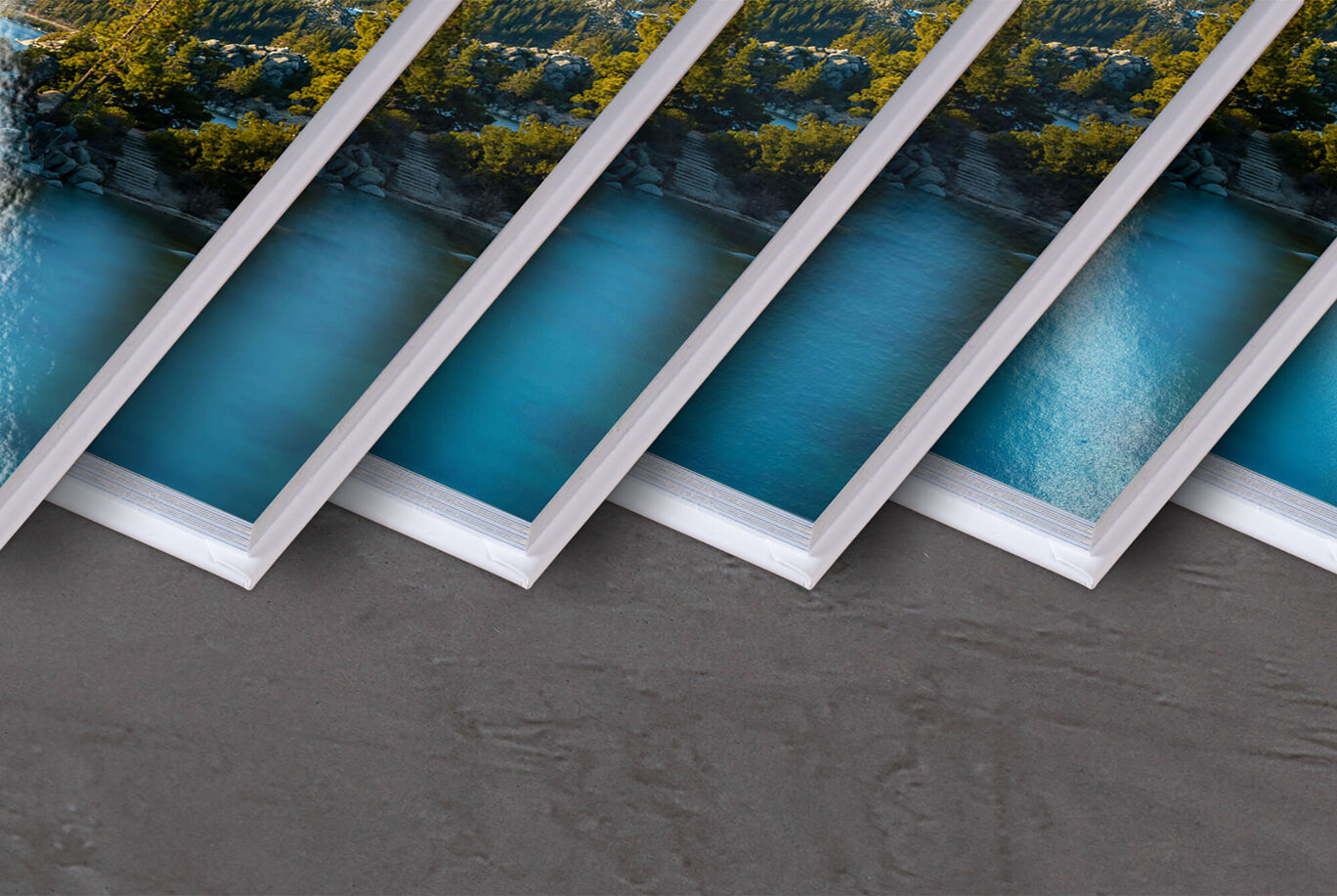 Five overlapping wall art pieces with blue water and nature motifs.