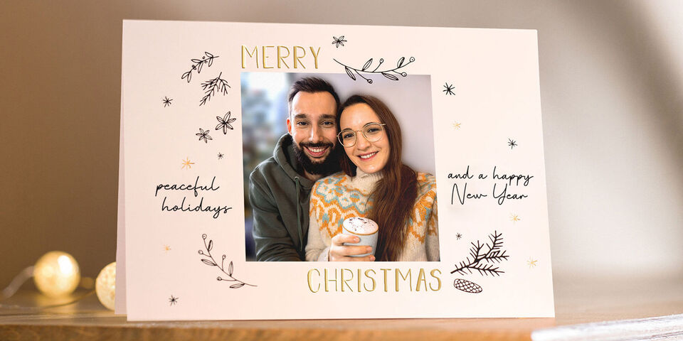 Merry Christmas greeting card with festive design.
